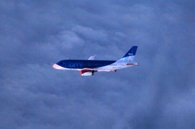 Airbus A319 (G-DBCH) - Brand new AIRBUS A319 from BMI, UK, circling to land in LHR (like us) for over 1 hour!br /Very dark time of day! From a window of a BMI A320, from Leeds to LHR... DEC2006