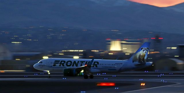 Airbus A320neo (N362FR) - As the final moment of sunset light is disappearing behind the Sierra Nevada and darkness is falling across the Truckee Meadows; FFT's N362FR, "Wellington the Blackfooted Ferret," is about to touch its nosegear tire down on the 16R concrete to complete a 5 PM arrival from KLAS.