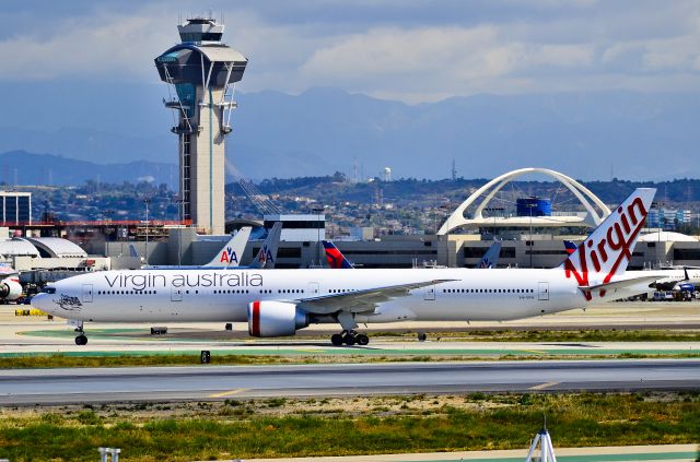 BOEING 777-300 (VH-VPH) - VH-VPH Virgin Australia Airlines Boeing 777-3ZG/ER / 7C6C73 (cn 37943/898) St Kilda Beach  Arriving from Sydney as VA1 to LAX in her first trip with the new scheme...  Los Angeles International Airport (IATA: LAX, ICAO: KLAX, FAA LID: LAX) TDelCoro April 12, 2012