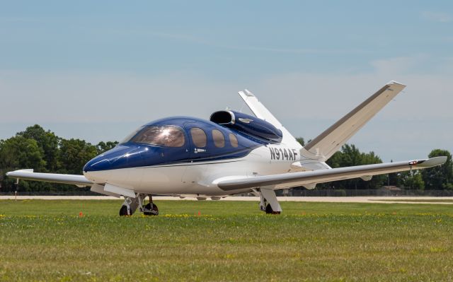 Cirrus Vision SF50 (N914AF) - A Cirrus SF-50 Vision Jet vacating the runway at Oshkosh after a 2 hour flight from Nashville.