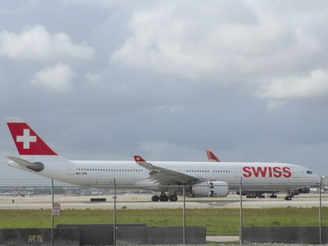 Airbus A330-300 (HB-JHK) - Additional fin.Supplied by a British B744.At a distance!