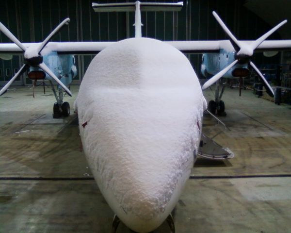 de Havilland Dash 8-300 (OE-LTM) - After a cold night.