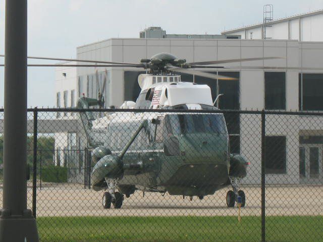 Sikorsky Sea King (MARINEONE) - The Sikorsky VH-3D Sea King, commonly known as "Marine One" when transporting the President of the United States, sits on the ramp at DuPage Airport awaiting the arrival of the President at OHare.  The Presidential Lift Fleet then departs DuPage and transports the President from OHare to his local destinations.  Taken August 1, 2011.