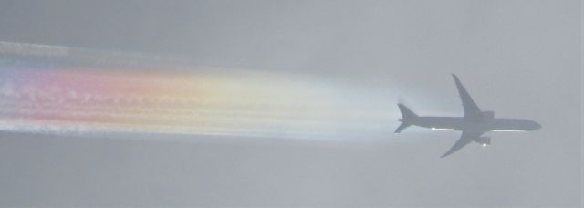 BOEING 777-300ER — - Super rare shot!!!!!! JAL 777-300 with a RAINBOW contrail!!!!!!!!!! Photo taken near BUF.