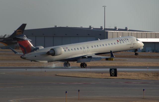 Canadair Regional Jet CRJ-900 (N134EV) - Delta (Envoy Air) 5220 smocks DSM Runway's 23 after a nearly two hour flight from Detroit Metro. Photo taken Match 4, 2020 at 4:58 PM with Nikon D3200 at 2400.