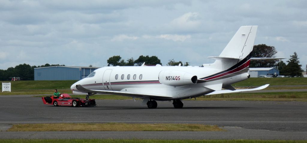 Cessna Citation Latitude (N514QS) - Getting a tug is this 2016 Cessna 680A Citation Latitude from the Summer of 2023.