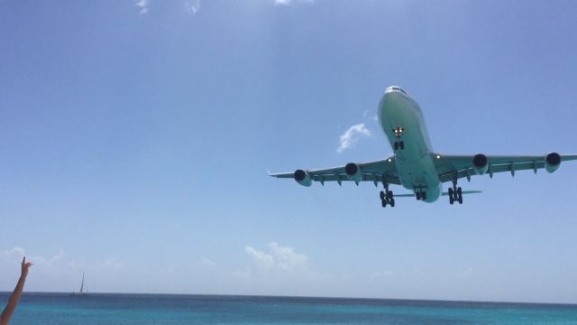 Airbus A340-500 — - On the beach at St Maarten.