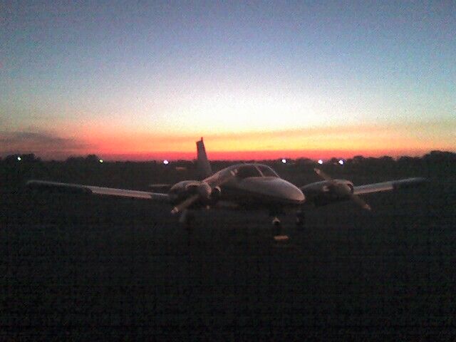 Piper Seneca (N544BP) - Sitting on the ramp at night.