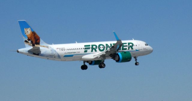 Airbus A320neo (N328FR) - Shortly after departure is this 2018 Frontier Airlines Airbus A320-251N with "Scout" the Pine Marten looking back in the Spring of 2021.