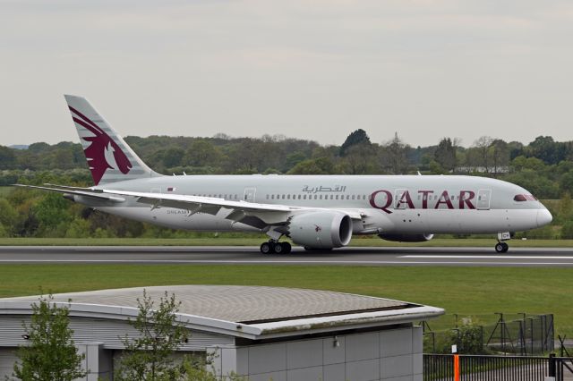 Boeing 787-8 (A7-BCR) - QTR27, the lunchtime flight, arrives from Doha on 05R, passing the fire station