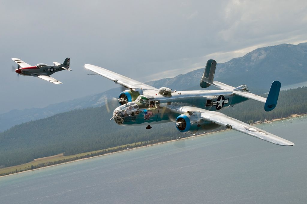 N7946C — - The North American B-25J Mitchell Old Glory and the North American P-51D Mustang Sizzlin Liz in formation over a stormy Lake Tahoe, CA.