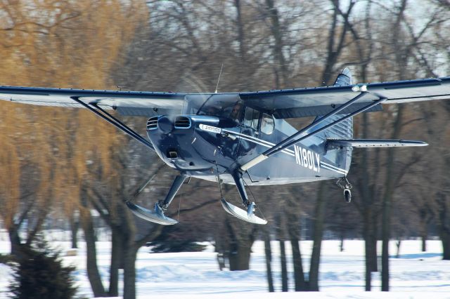 Piper 108 Voyager (N180LY) - Stinson Voyager landing at EAA Oshkosh Ski Plane Fly-In.br /br /1 month before Covid-19 Pandemic World Shut Down 