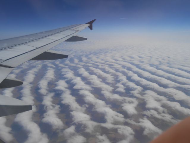 Airbus A320 (N621AW) - I have never seen clouds like this before.