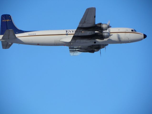 Douglas DC-6 — - Everetts Air taking off from PAFA. What a clean looking DC-6. I dont use any photo editing software or whatever you call it. What you see is what I took.