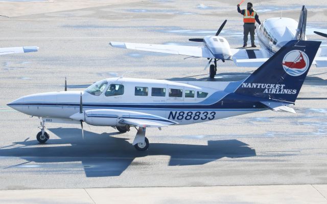 Cessna 402 (N88833) - A Cape Air Cessna 402 taxing in at BOS.