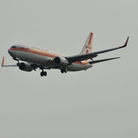 Boeing 737-800 (PK-GFN) - Landing from Singapore, Garuda Indonesia with old image logo