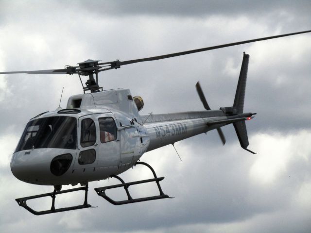 Eurocopter AS-350 AStar (N543MM) - Lifting off from KPOC