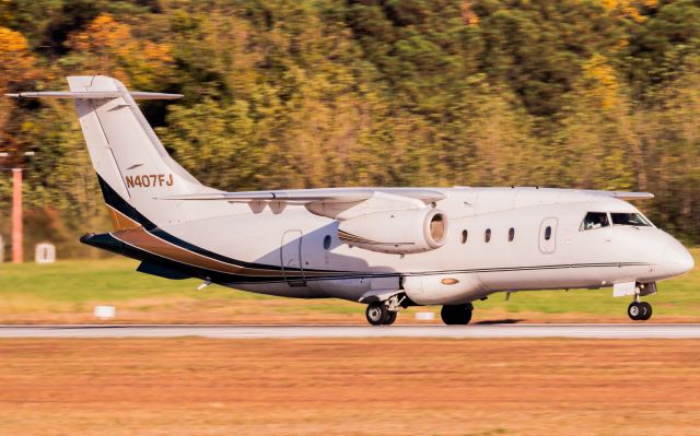 Fairchild Dornier 328JET (N407FJ) - PDK Spotting bleachers, Canon EOS SL1, EF 400mm f/5.6L