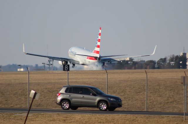 Boeing 737-800 (N820NN) - Smoky touchdown on 33L.