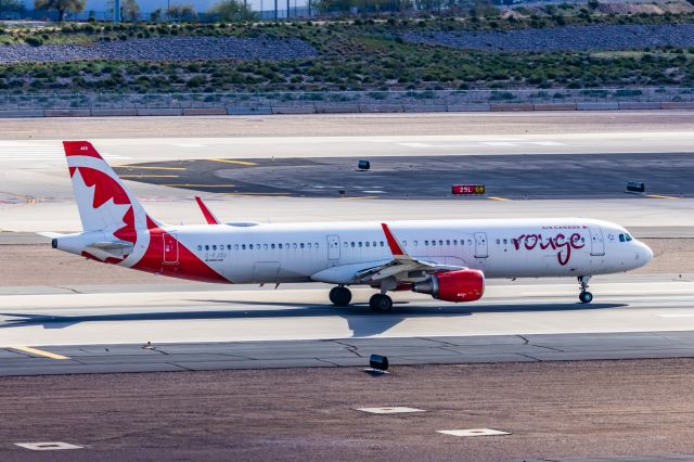 Airbus A321 (NCFJOU) - An Air Canada Rouge A321 taking off from PHX on 2/28/23. Taken with a Canon R7 and Canon EF 100-400 L ii lens.