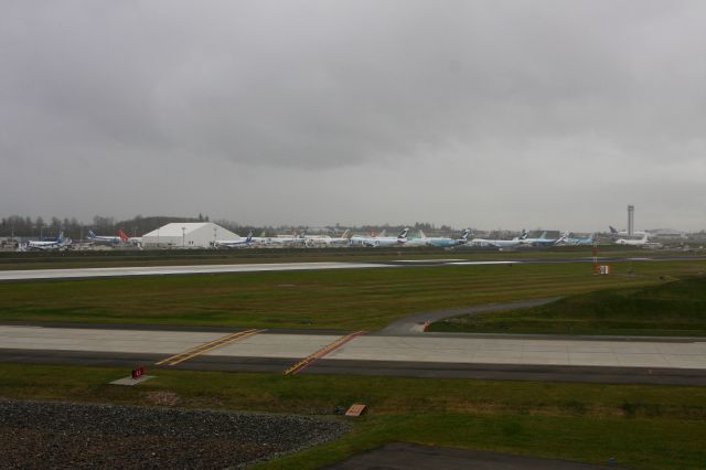 KPAE — - Boeing Flight line at Paine Field.  How many planes can you count.