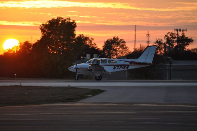 Beechcraft 55 Baron (N7216R) - N7216R landing after the missing man formation for Frank Hailes memorial.