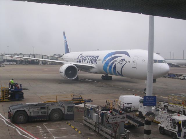 Boeing 777-200 (SU-GDN) - Egypt Air at LHR T3, gate 28, 031611.