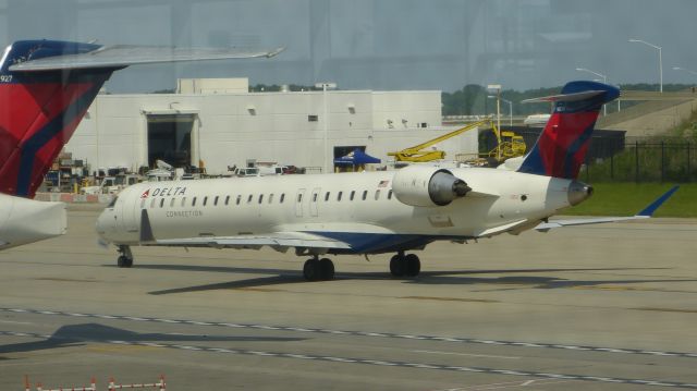 Canadair Regional Jet CRJ-900 (N320PQ) - Taxiing for departure to Raleigh.br /Del to Endeavor Air (DAL) in 2014