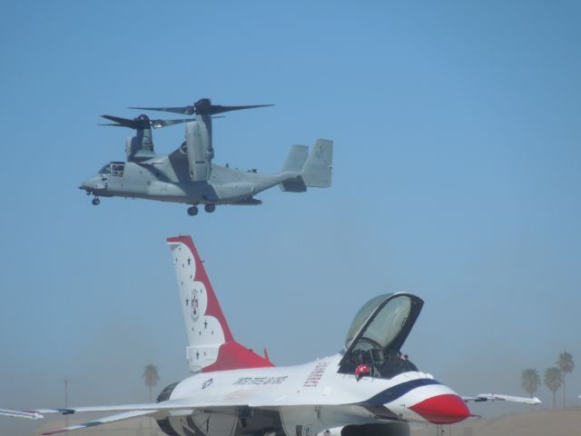 Bell V-22 Osprey — - An Osprey descending behind a Thunderbird at Thunder in the Desert 2014.