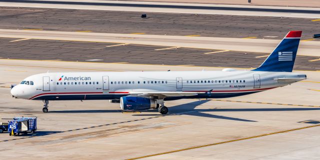 Airbus A321 (N578UW) - An American Airlines A321 in US Airways retro livery taxiing at PHX on 2/4/23. Taken with a Canon R7 and Tamron 70-200 G2 lens.