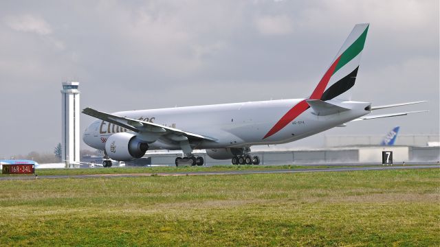 Boeing 777-200 (A6-EFK) - UAE778 during its take off roll on runway 34L beginning its delivery flight to Hong Kong (VHHH / HKG) on 3/28/13. (LN:1088 cn 35611).