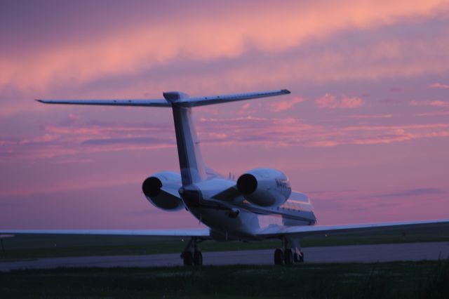 — — - Purple Sunset Outagamie County Airport / Appleton, WI -at Gulfstream Hangar