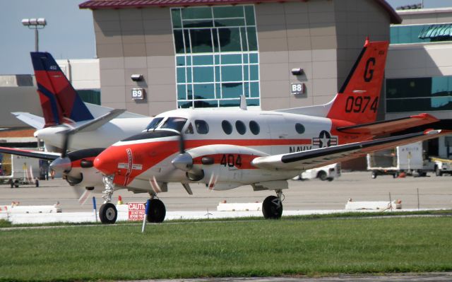 Beechcraft King Air 90 (BN160974) - A Navy T-44C Pegasus (160974) taxis to Air 51 at Blue Grass Airport (KLEX) for refueling, following a companion T-44 by a few minutes....