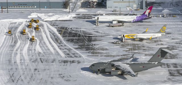 — — - The ramp at Bangor Royal Air Force C17, Primera Boeing 737-8K5, ex Hawaiian Boeing 767-33A and of course those snow ploughs! Merry Christmas to all FlightAware fans