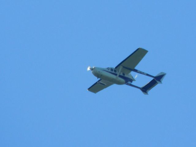 Cessna Super Skymaster (N77CM) - In my backyard, as I am located at N53, and he came from White Plains was doing some low flying in my town.