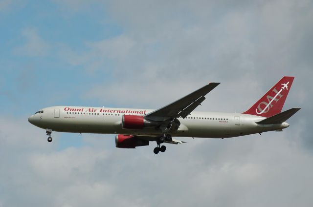 BOEING 767-300 (N378AX) - Caribbean Airlines - Inaugural Flight BW902 Operated by Omni Air International (N378AX) Seen arriving at Gatwick Airport. Courtesy Alec Wilson ©