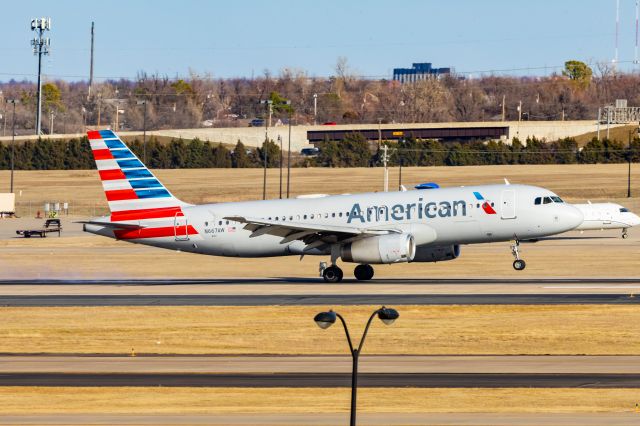 Airbus A320 (N667AW) - American Airlines A320 landing at OKC on 1/1/23. Taken with a Canon R7 and Tamron 70-200 G2 lens.