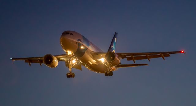 Airbus A310 (CS-TKN) - Trying my hand at some night shots…Hard!!