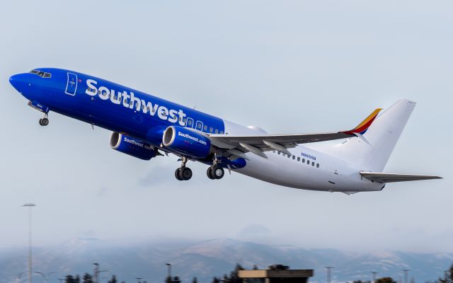 Boeing 737-800 (N8656B) - N8656B leaving GEG to Paine Field for MRO work. Looks like aircraft had painting cut short for MX work.