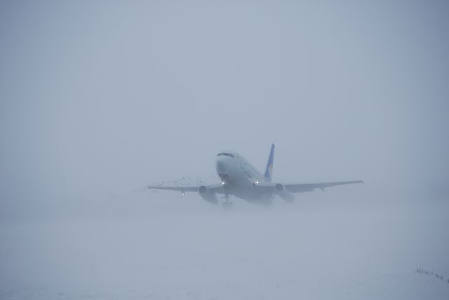 C-GOPW — - Canadian North taking off during a blizzard.