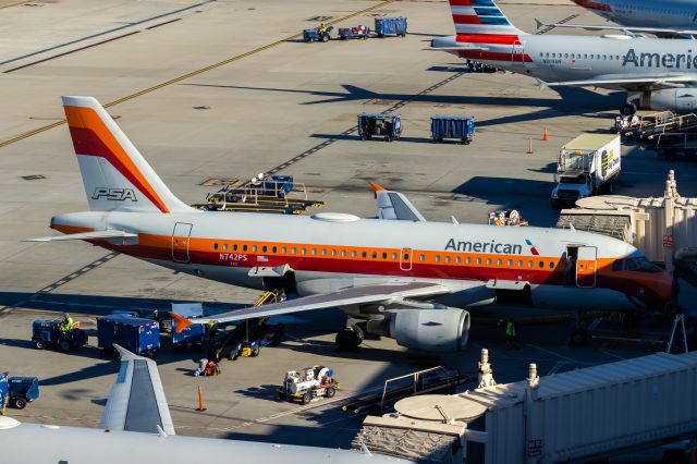 Airbus A319 (N742PS) - American Airlines A319 in PSA retro livery parked at the gate at PHX on 9/17/22. Taken with a Canon 850D and a Canon EF 70-200mm f/2.8L IS II USM lens. 