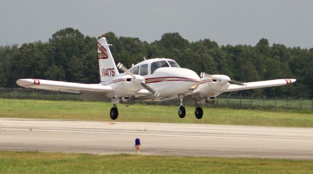 Piper Apache (N14175) - A Piper PA-23-250 Aztec, arriving Runway 18, Pryor Field Regional Airport, Decatur, AL - August 22, 2017.