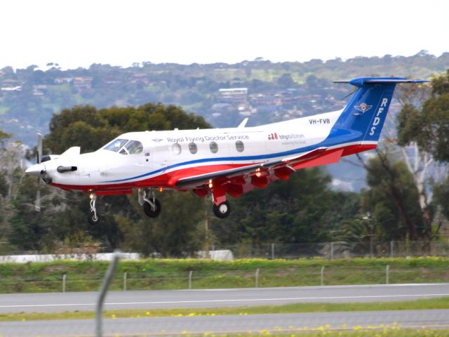 Pilatus PC-12 (VH-FVB) - About to put down on runway 05. Thursday 12th July 2012.