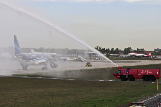 Airbus A320 (4K-AZ77) - Receiving a welcoming shower to celebrate the inaugural flight of the AHY A320 service between GYD-TXL-GYD 