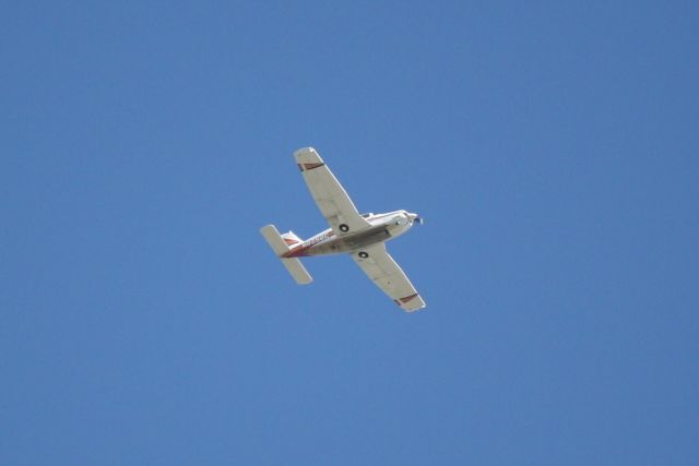 Piper Cherokee (N8256C) - Piper Cherokee (N8256C) flies over Tampa International Airport