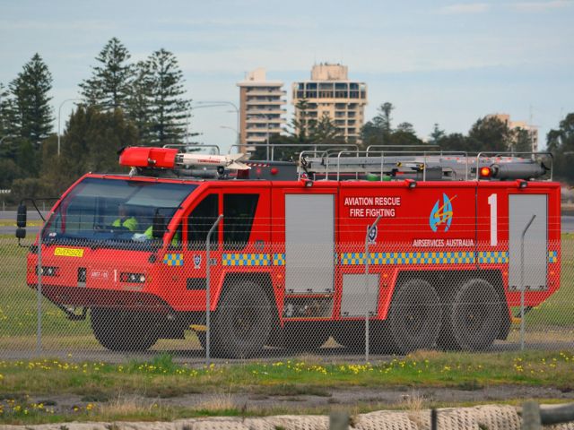 — — - Aviation Fire Rescue vehicle patrolling the perimeter fence at Adelaide International Airport.br /Thursday 12th July 2012.