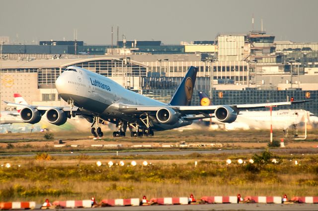 BOEING 747-8 (D-ABYM) - Ultra long range shot from the Apes Rock in the direction of terminal 1 in Frankfurt. Airplane was departing runway 25 C in the evening!! This pic was snapped freehand on a very clear and sunny day in octobre 2017