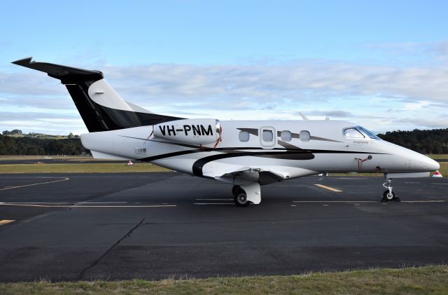 Embraer Phenom 100 (VH-PNM) - EMBRAER-EMPRESA BRASILEIRA DE AERONAUTICA, EMB-500 Phenom 100 VH-PNM, sn 0000206 at Wynyard Airport Tasmania Australia 3 April 2022.