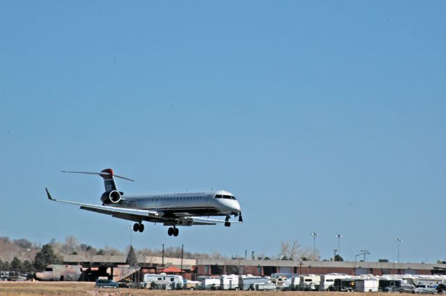 Canadair Regional Jet CRJ-900 (N933LR) - Landing into the gusty winds.