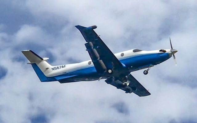 Pilatus PC-12 (N567AF) - A PC-12 taking off from Downtown Greenville, SC headed to Roanoke.  Viewed from the Runway Park.  10/24/20.